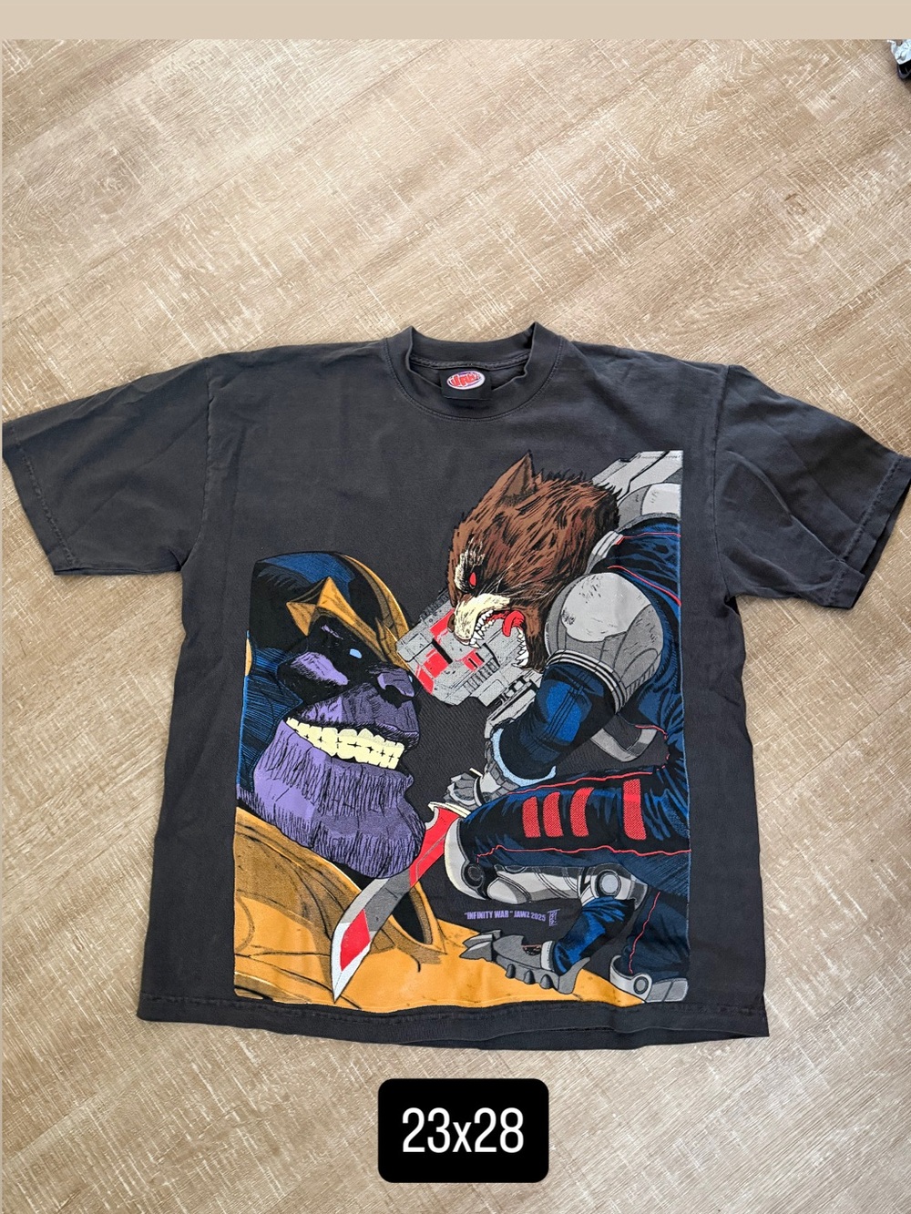 Marvel Thanos vs Rocket Raccoon jaws men’s large faded tee